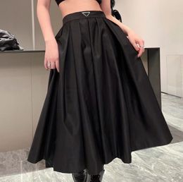 Designer femmes robe mode re-nylon robes décontractées été super grande jupe spectacle pantalons minces jupes de fête noir vêtements pour femmes taille S-L