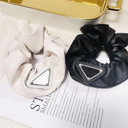 Diseñador para mujer Bandas de goma para el cabello Pelos Scrunchy Clips de anillo Elástico Triángulo invertido Diseñadores Deportes Danza Scrunchie Hairband Pony Tails Holder