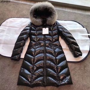 Diseñador para mujer largo abajo con cuello de piel insignia de letra bordada chaqueta de invierno abrigos ropa