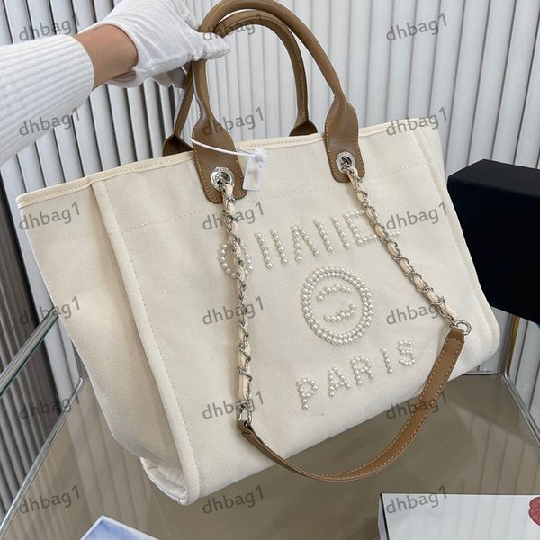 22SS para mujer Bolsa de playa Mango superior Pearl Pearl Fin-Fin-Body Denim Handim Handbag Mark Bolden de compras al aire libre