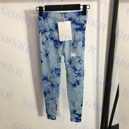 Pantalones de diseñador para mujer Logotipo de la letra Pantalón de yoga Leggings deportivos Pantalones de chándal estampados de moda Dos colores