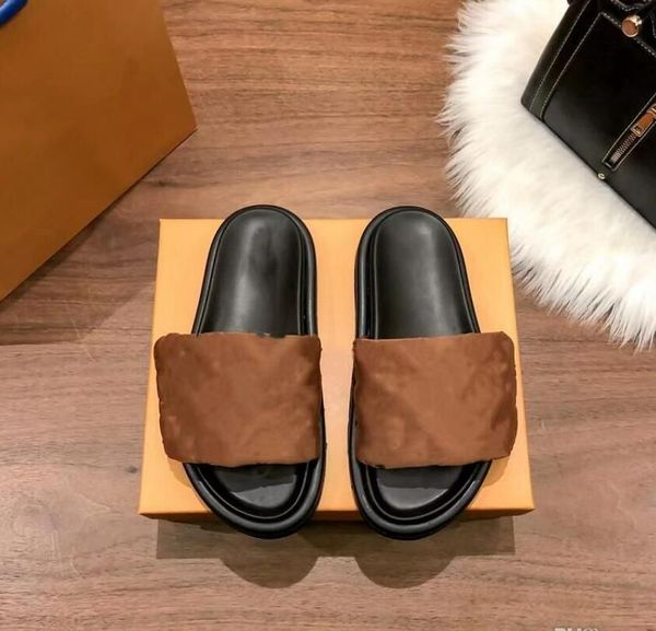 Diseñador para mujer Zapatillas Marca de moda Nuevo 2023 Zapatillas en relieve Zapatos Sandalia de cuero Puesta de sol Suela de goma Sandalias para mujer hombre zapatillas