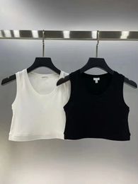 Camiseta de diseñador para mujer Camiseta sin mangas para mujer camiseta gris corta Tanques para mujer Camiseta de moda Camiseta deportiva de punto Camiseta sin mangas para mujer Mini trajes Camiseta sin espalda elástica sólida