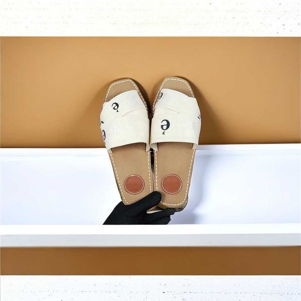 designer Woody marque sandales femmes Mules plates diapositives Beige clair beige blanc noir rose dentelle Lettrage Tissu pantoufles en toile pour femmes chaussures de plein air d'été Talon bas