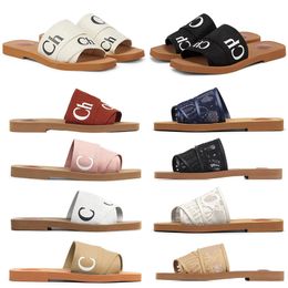 Diseñador Woody Zapatillas Sandalias Diapositivas Deslizadores para mujer Mulas Diapositiva plana Tostado claro Beige Blanco Negro Rosa Encaje Letras Tela Lona Mujer Zapatilla Sandalia deslizante