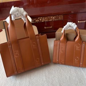 Diseñador Woody Tote Bag Mujer Luxurys 5A Calidad Bolso para hombre Cuero genuino Woody Hombro Bolsas de compras Totes de viaje Bolsos Bolsos Diseñadores Bolsas