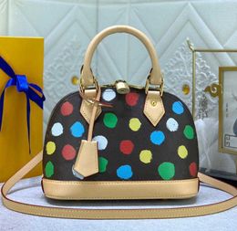 Ontwerper YK Dots Shell Bag Polka schoudertassen dames luxe echt lederen handvat damesmode Polka Dot Crossbody tassen Hoge kwaliteit oude bloem minderheid handtas