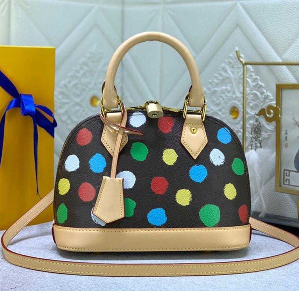 Designer YK Dots Shell Bag Polka Sacs à bandoulière Womens Luxury Genuine Leather Handle ladies Fashion Polka Dot Crossbody bags High Quality Old Flower Minority Handbag