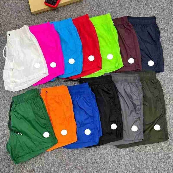 Shorts de créateurs pour hommes Pantalons de jogging courts pour hommes avec intranet au-dessus du genou Britches Poches à glissière à entrejambe basse Étiquettes brodées blanches Pantalons courts de plage categ