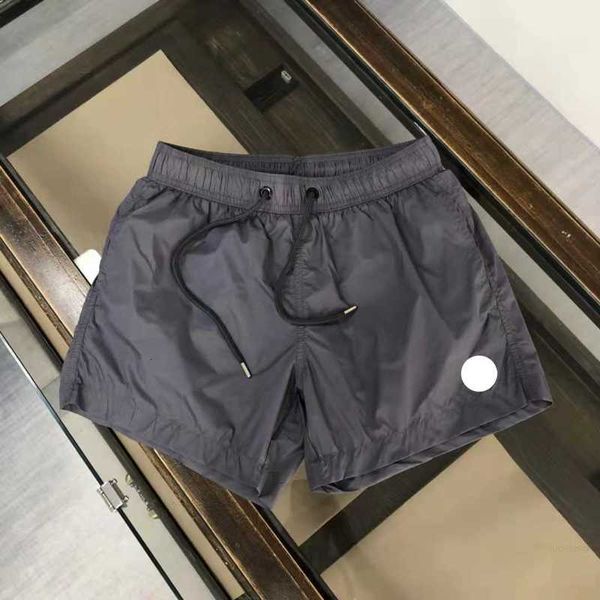 Diseñador para hombre chino corto pantalones cortos de diseño Gimnasio de verano Culturismo Correr Pantalón corto masculino Longitud de la rodilla Fitness Natación de secado rápido Gimnasio para hombres pantalones cortos para hombres Pantalones deportivos pantalones cortos de malla