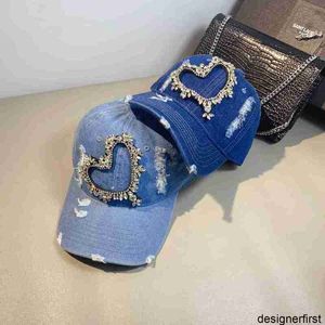 Diseñador Nueva versión coreana de Love Diamond Denim Sombrero de pico de pato perforado para mujeres en otoño Moda Protección solar versátil y protección solar Sombrero de béisbol Tendencia Gato