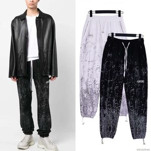 Designers Casual Pant Streetwear Pantalons Pantalons de survêtement Tendance Mode américaine Amires Crack Tie Pantalon de sport teint imprimé Leggings de garde décontractés