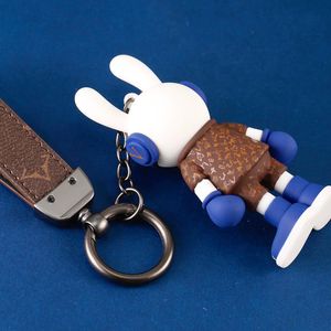Créateurs poupée porte-clés bijoux mode sac à dos pendentif tendance avancée corde ensemble boutique clés chaîne cadeau adapté aux hommes et aux femmes
