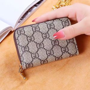 Clásico de alta calidad Mujer Carteras Diseñadores Cartera larga de cuero Monederos Flor Hombres Mujeres Moda Luxurys Bolsos Titulares de marcas famosas Bolsillo con caja