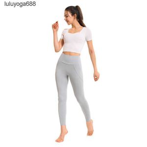 Ontwerpers Lululemens Damesmode merk Yoga Wear T-shirt High Strength Gathering Slank 2023 Pasvorm Korte mouw Hardlopen Fitness Sport Dames yogakleding voor dames