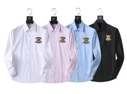 Diseñadores Camisas casuales para hombre Diseñador de calidad Camisetas de negocios Camisa de manga larga clásica Carta de color sólido Blusa de primavera y otoño