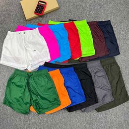 Diseñadores shorts para hombres 13 colores hombres y mujeres cortos verano seco rápido pantalones casuales de cinco puntos de cinco puntos pantalones cortos de natación pantalones cortos de playa asiático s-3xl