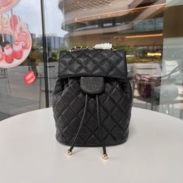 Diseñadores Smooth Mini Mochila Mochila de cuero genuino para niños Mochila con estampado marrón Bolsas de viaje Bolsos de moda para dama