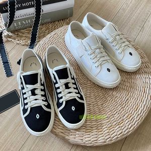 Diseñadores zapatillas de deporte plataforma zapato de lona de lujo mujeres clásico negro blanco encaje hasta casual cómodos zapatos de tablero zapato de galleta