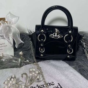 Designers vivienne Light Luxury Fashion Versatile Handheld Sac de qualité Femme Small Stand Light Luxury Bag de coréen pour sortir