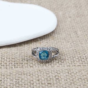 Ontwerpers bruiloft 18K ring liefde Sieraden ontwerper Luxe Gouden ringen Klassieke Twisted CZ Vrouwen Blue Topaz Zirkoon Hoepel Mode Geschenken