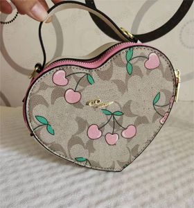 Desinger-Bolso en forma de corazón, Mini bolso de hombro bonito para mujer, bolso de mano Vintage nublado, bolso cruzado rosa de cuero a la moda