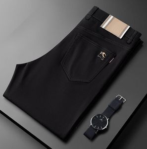 Desinger nieuwe top heren jurk broek uit broek mode mode zwart kaki kleur zakelijk broek recht werk voor mannelijke solide kleur magere panting kleding