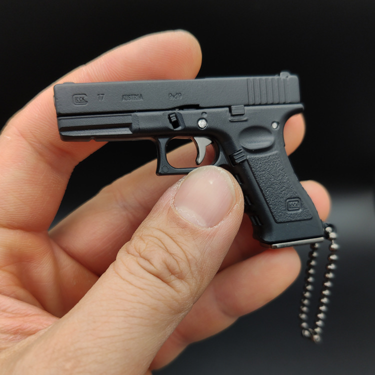 Odpinany pistolet ze stopu G17 Model pistoletu miniaturowy pół stopu metalu Mini pistolet brelok wisiorek pistolet wymienny 1985