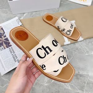 Dhgate Designer Sandaal Heren Woody Clog Mule Platte sandaal Slide Letter Loafers Tazz Slipper Dames roze rode pantoffels Zomerstrand Platform Canvas schoen Flip Flop