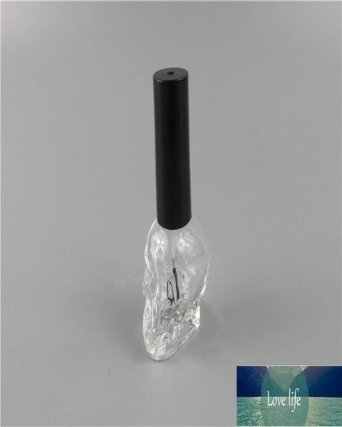 DHL 100pcslot 10ml botella vacía de esmalte de uñas de calavera con cepillo pequeño negro contenedor de Arte de uñas botellas de aceite de vidrio para uñas 3640450