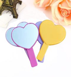 DHL hartvormige reishandheld spiegel cosmetische handspiegel met handgreep make -upspiegels schattige liefdesvorm cosmetisch gereedschap lx25735170792