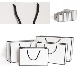 Dhl Ship Kraft Paper Bags Sacs d'emballage de carte blanche Advertis Fashion Storage Handsbag Shopping Party Perum personnalisé 9021407
