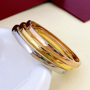 Amantes de los diamantes Pulsera Joyería de diseño Brazalete de oro mujeres hombres titanio acero plata 4CZ para mujeres para hombre regalo de fiesta pulseras de firma Brazaletes de pareja de lujo