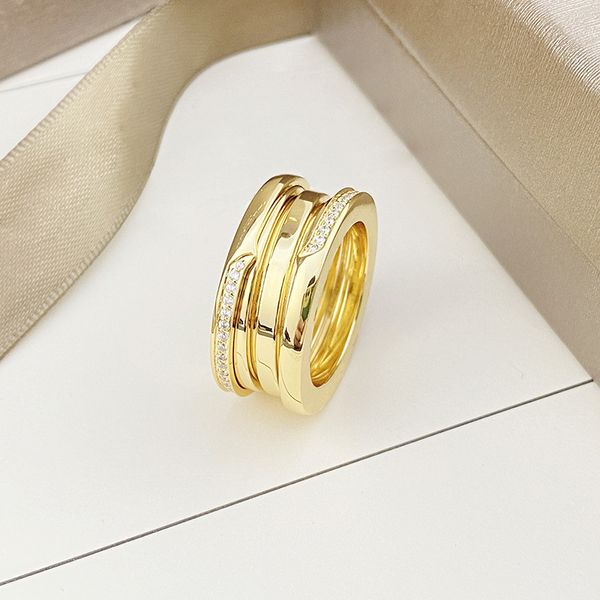 Boda de diamante Anillo de amor de acero de titanio Sier Hombres y mujeres Joyería de oro rosa para amantes Anillos de pareja Tamaño de regalo 5-12 Chapado en oro amante