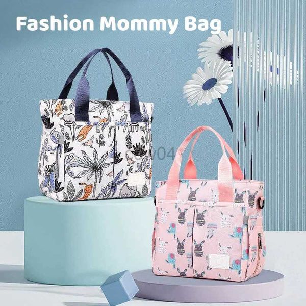 Sacs à couches Mommy Baby Diaper Sac à main sac à main grande capacité Organisateur Pounch Set Sling Messenger Tote Crossbody Sac femme Sacs élégants à grande taille D240429