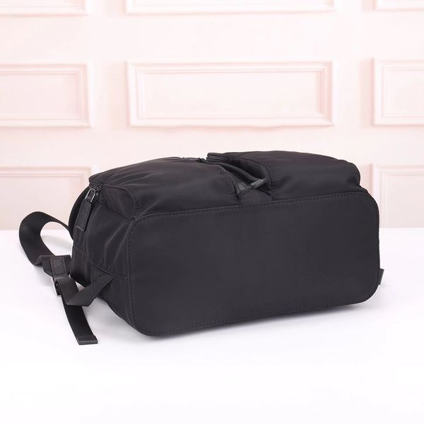 Dicky0750b gros classique en nylon imperméable à l'eau grande capacité sac à dos Oxford spinning mode rétro hommes portable sac à dos mode mince sac de voyage