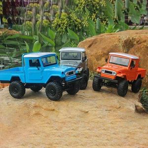 Diecast Model Cars Nieuwe handleiding DIY 1 12 MN45 Model MN45K KIT Vierwielaandrijving Elektrische afstandsbedieningsauto Childrens Pick-up Truck Model auto speelgoed J240417