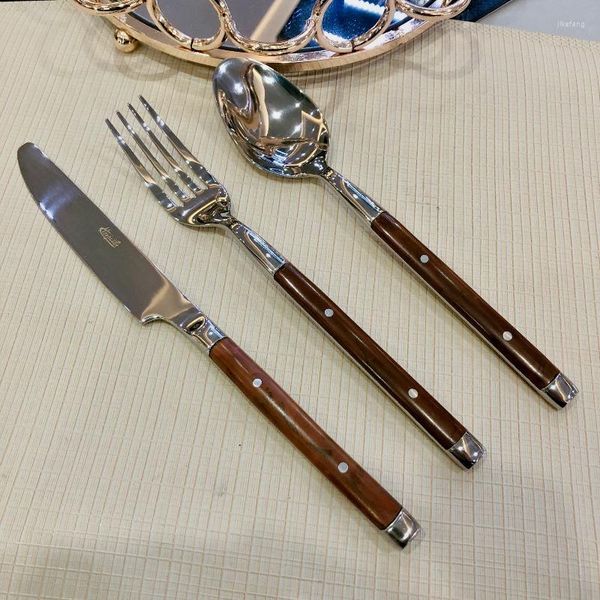 Conjuntos de vajilla Cuchillo de acero inoxidable Tenedor y cuchara Juego de vajilla occidental Mango de grano de madera Mesa de comedor Dos clavos Accesorios de cocina