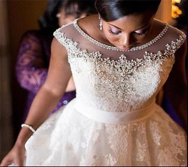 Discing une ligne couche transparente avec des perles robe de mariée plus taille robe de mariée de taille en Afrique du Sud Vestidos de noiva5423517