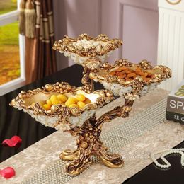 Affaires et assiettes Assiette de fruits multicouches européens maison créative assiette sucrée de table basse de salon moderne ornements