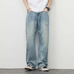 Jeans en détresse pour hommes en 2024, nouvelle marque, tube droit ample de style américain pour hommes, pantalon tendance à fleurs lavées et nouées