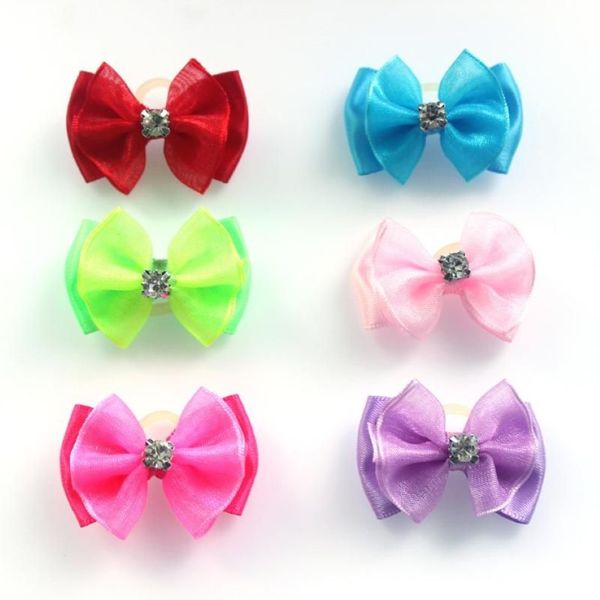 Ropa para perros 100 unids Hecho a mano Pet Hair Bows Rhinestone Variedad Cinta de encaje Arco Perros Accesorios de aseo Suministros285h