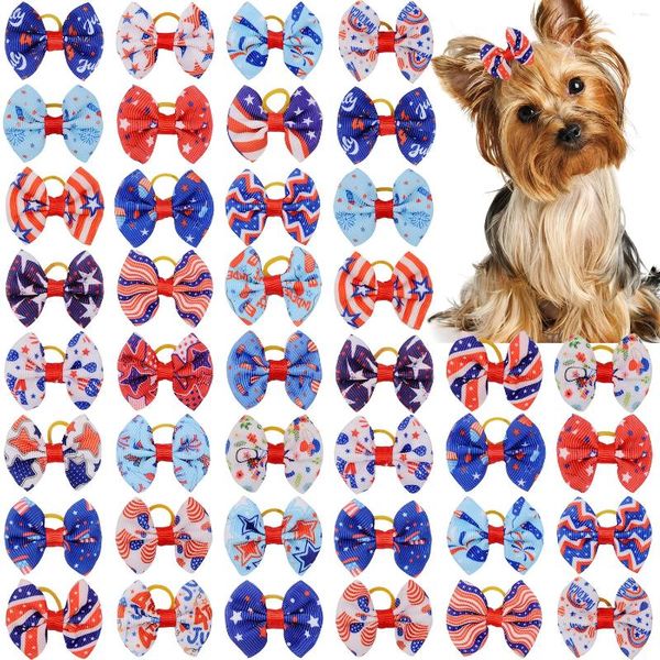 Ropa para perros 100 unids Día de la Independencia Topknot Bows Pet Hair Bandas de goma Patrones Grandes Accesorios de estilo Bowknot