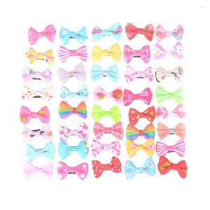 Vêtements de chien 10pcs Barrettes colorées Ruban pour animaux de compagnie Pince à cheveux Bows Filles Épingles à cheveux Accessoires Hairgrip Headwear