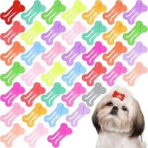 Vêtements de chien 10pcs pinces à cheveux pour chiens 1 pouce minuscule pince à nœud os snap barrette de toilettage pour animaux de compagnie mini imprimé muticolored