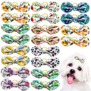 Vêtements de chien 10pcs chiots coiffure bowknot casse-tête printemps pour animaux de compagnie Small arcs élassicoles fournit des accessoires de toilettage