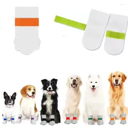 Ropa para perros 20pcs zapatos de mascotas blancas botas de cubierta de pie de tela no tejidas que no son tejidas para actividades al aire libre de mascotas