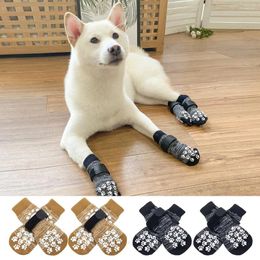 Appareils pour chiens 4pcs chaussettes antidérapantes pour animaux de compagnie réglables Protection antidérapante avec chiens chiens intérieurs