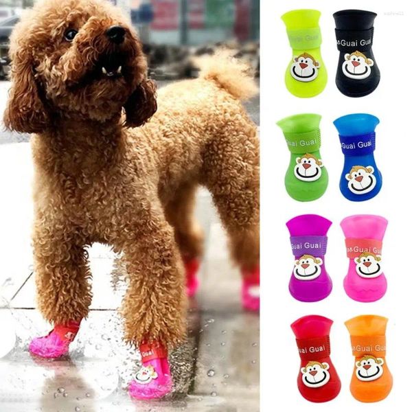 Ropa para perros 4pcs botas de mascota Silicone Rain Monkey Impresión Linda cinta adhesiva de sujetador zapatos de color brillante para al aire libre