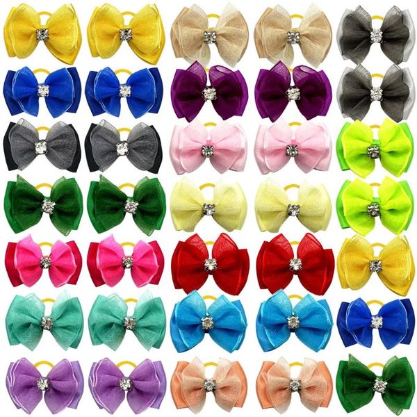 Ropa para perros 50/100 unids Hecho a mano Pet Hair Bows Rhinestone Variedad Cinta de encaje Arco Perros Accesorios Accesorios Suministros